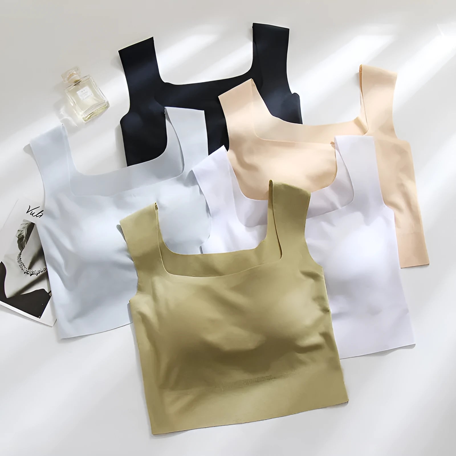 Women's non-marking nylon fixing cup sling vest in light blue colour showing seamless design
