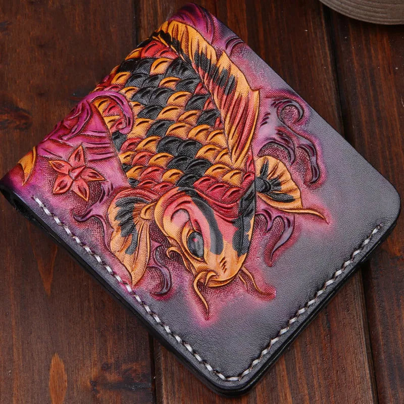 Men's cow leather wallet with carving detail in red, blue or gold colours showing open closure and compact size