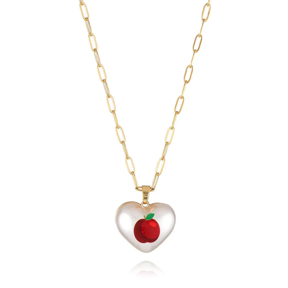 Adjustable chain necklace with a choice of geometric fruit pendant charms: apple, cherry, pear, pineapple, or strawberry.