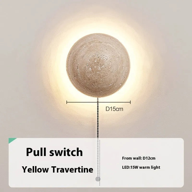 Vintage semicircle wall lamp with yellow cave stone shade and iron base, showing pull switch.
