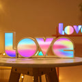 LED decorative light with rainbow lampshade displaying LOVE lettering for Valentine's Day decoration