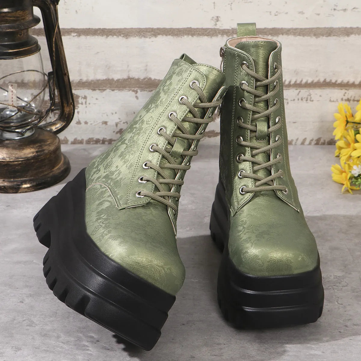 Women's black retro Martin boots with chunky heel, platform sole, and side zip.