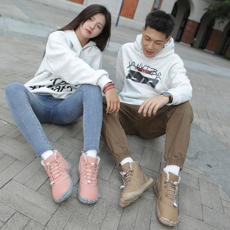 Waterproof unisex snow boots with lace-up front, fleece lining, and rubber sole in black, khaki, or pink.