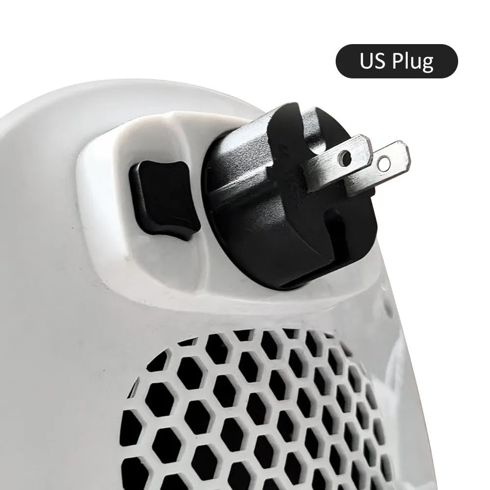White ceramic electric hot air blower heater with remote control on a table.