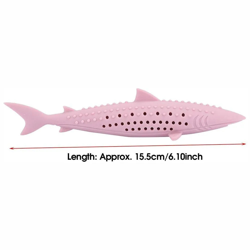 Green silicone fish-shaped cat chew toy with removable design showing breathable side holes