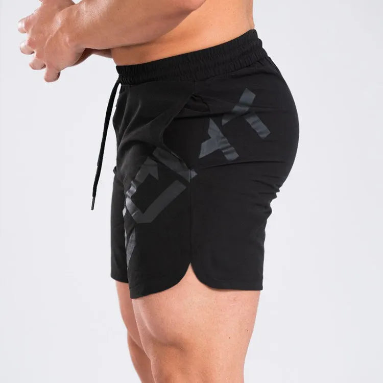 Men's black elastic running shorts with quick-dry fabric and knee-length design for summer training