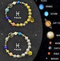 Set of twelve natural stone beaded bracelets, each with a different zodiac sign design, on an elastic string.
