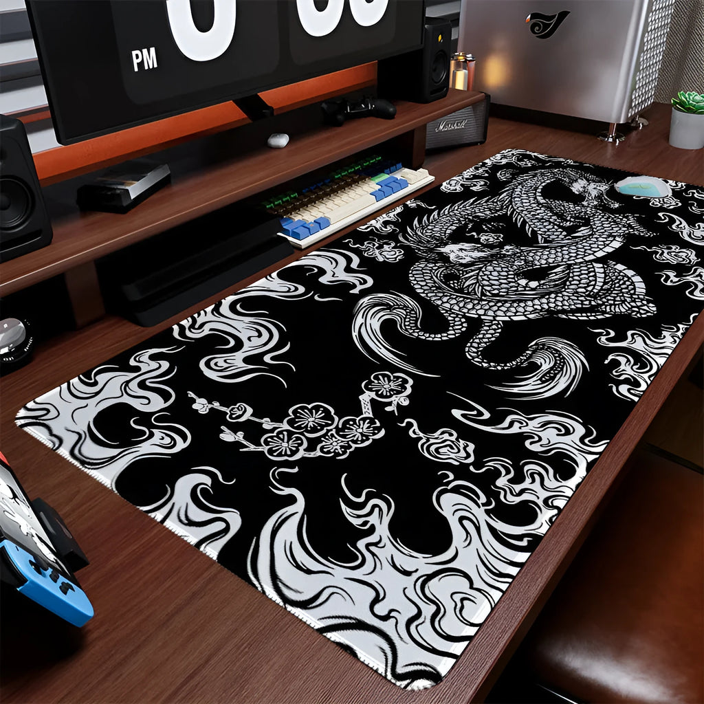 Gaming mouse pad with dragon artwork in multiple size options on desk