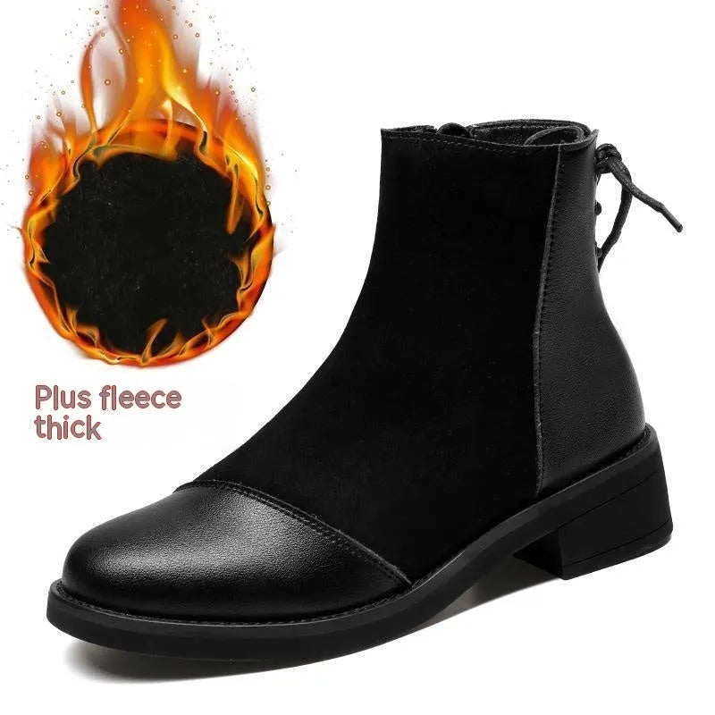 Women's black Martin boots with side zipper, round toe, and knee-length design