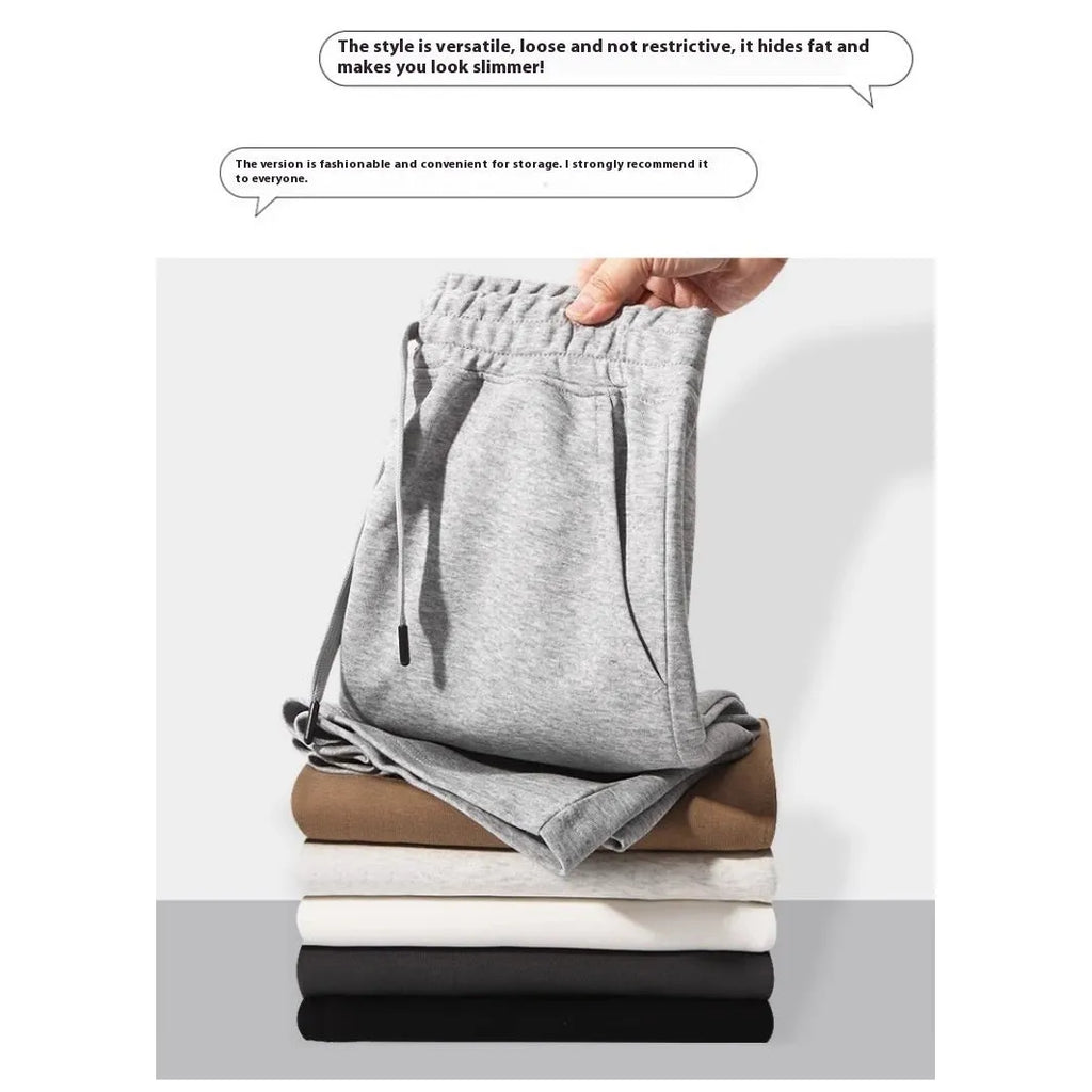 Cotton straight-leg men's shorts with elastic waistband in light grey colour.