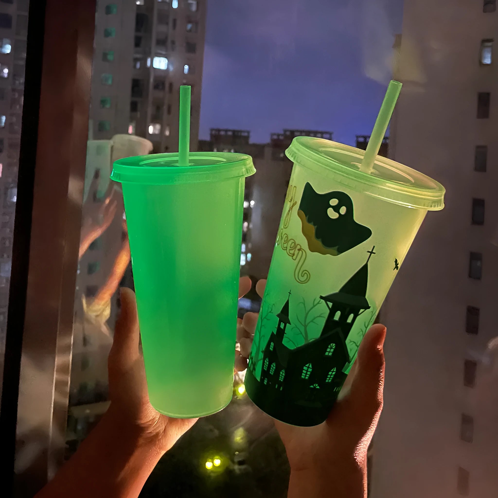 Halloween-themed luminous plastic straw cup with 720ml capacity in assorted colours.