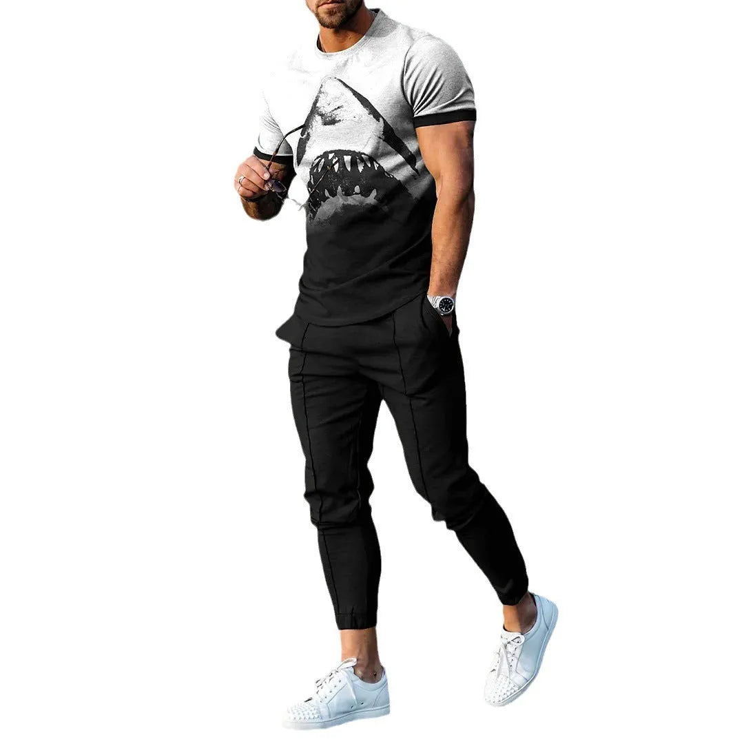 Men's short sleeve printed T-shirt and matching trousers sport suit set on a hanger.