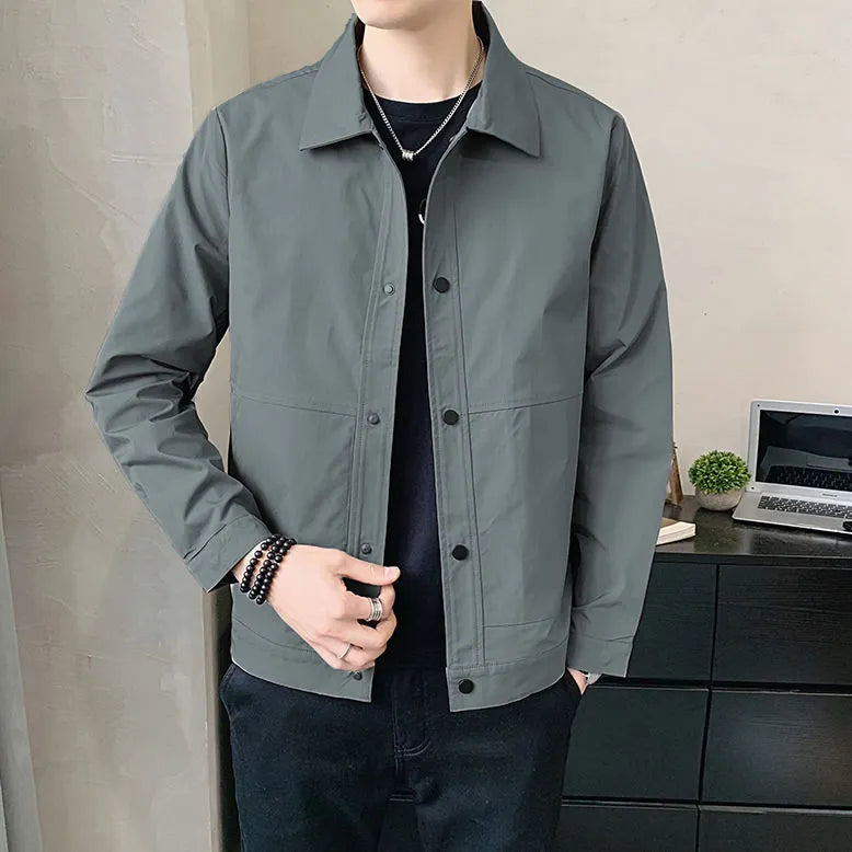 Men's thin single-layer Korean style jacket in a neutral colour on a hanger.