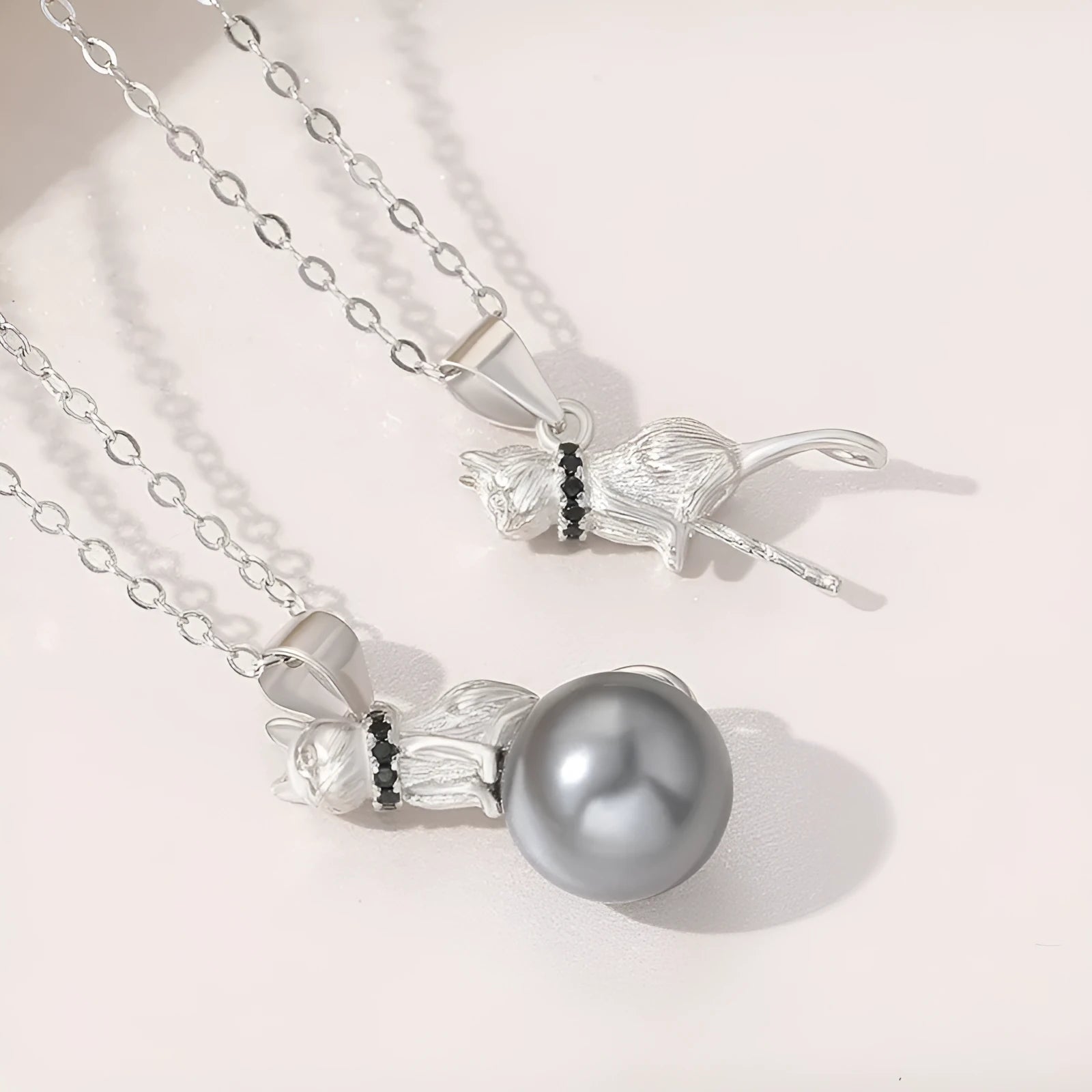 925 sterling silver cat pendant necklace with electroplated finish shown in D2113 and D2114 colour variations