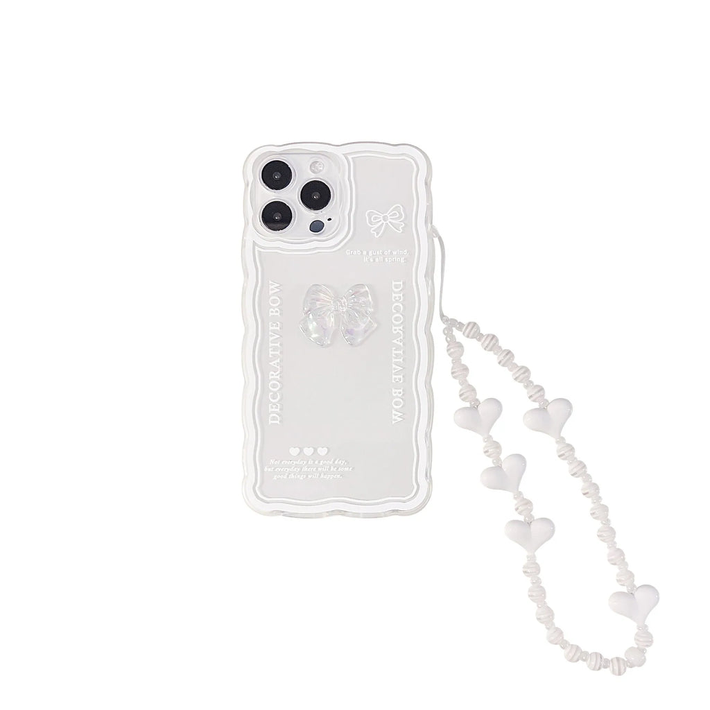 Clear iPhone phone case with transparent ice bow decoration on TPU back cover
