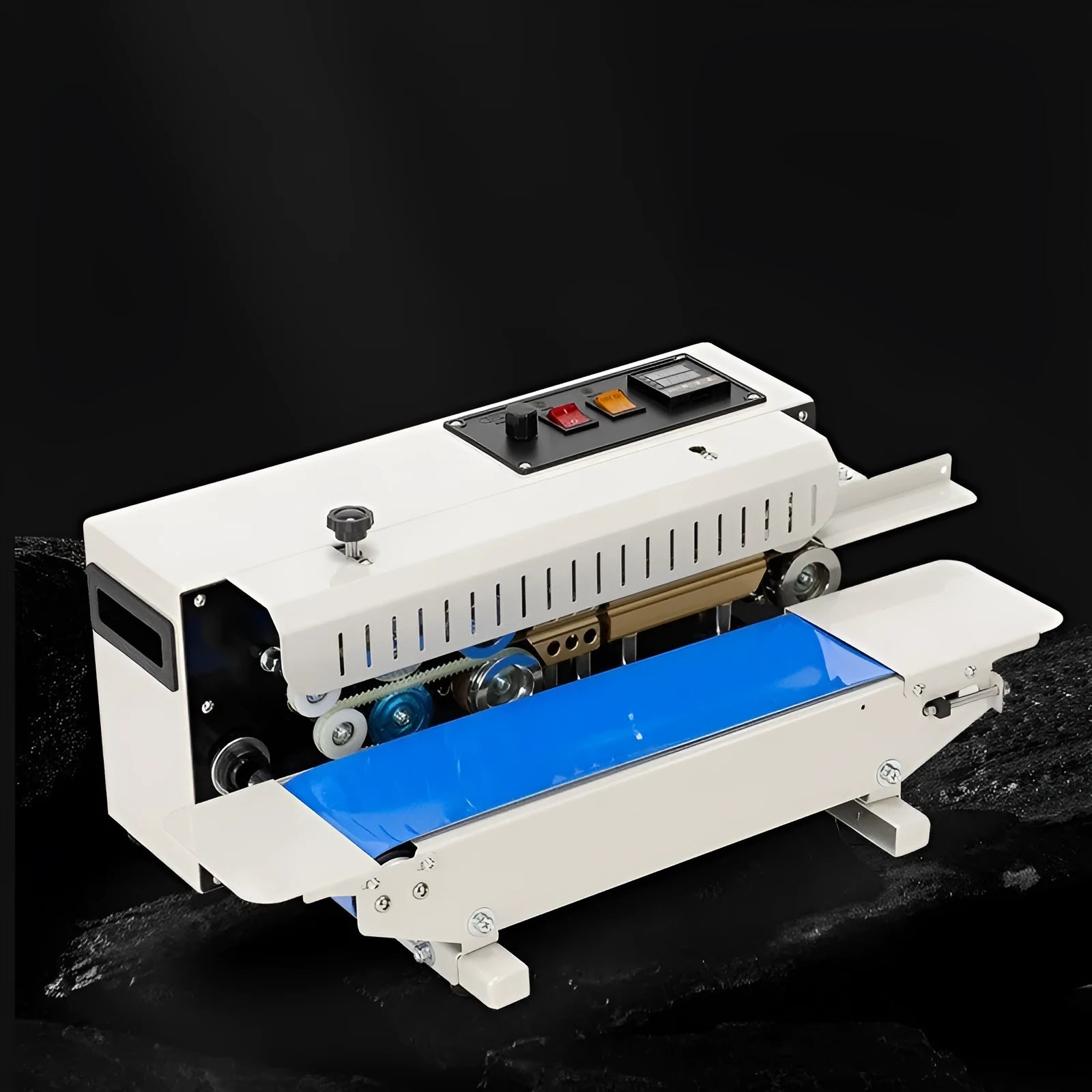 Small manual L1 steel seal date printing sealing machine on a table.