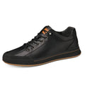 Men's white and black platform trainers with round toe and 6cm heel.