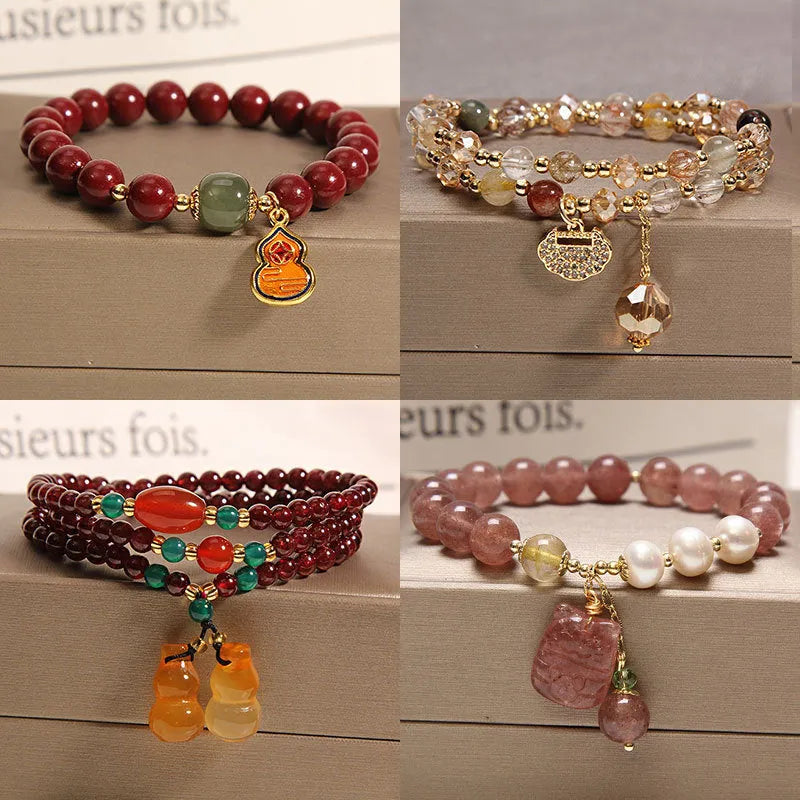 Women's multi-layer crystal bracelet with Korean design featuring natural garnet and assorted gemstone pendants