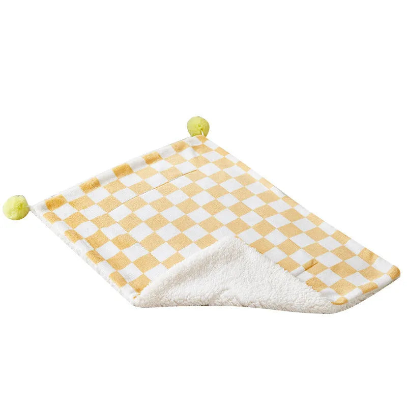 Green plaid pattern pet blanket with decorative fur balls for cats and dogs