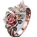 Adjustable colourful butterfly ring with oil drip finish and rose leaf details on alloy band