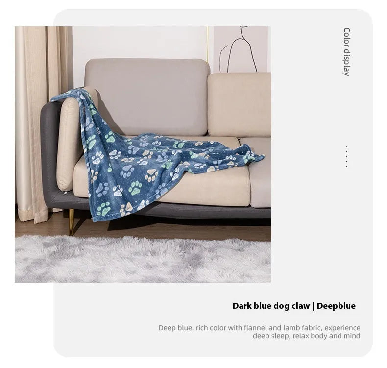 Blue cartoon dog print double-sided thickened flannel pet blanket laid flat.