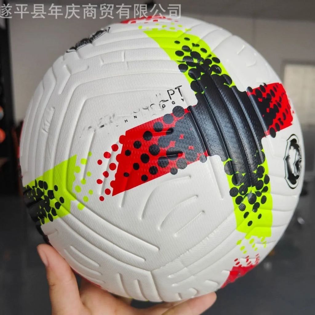 Fluorescent green official size 5 football with seamless thermal patch construction on a pitch.