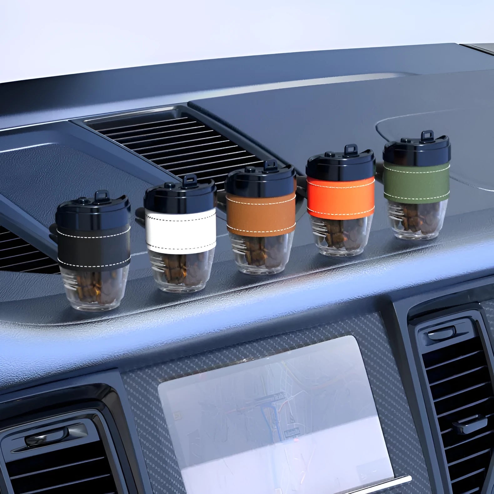 Coffee cup shaped car air freshener in various colours providing fragrance and odour removal.