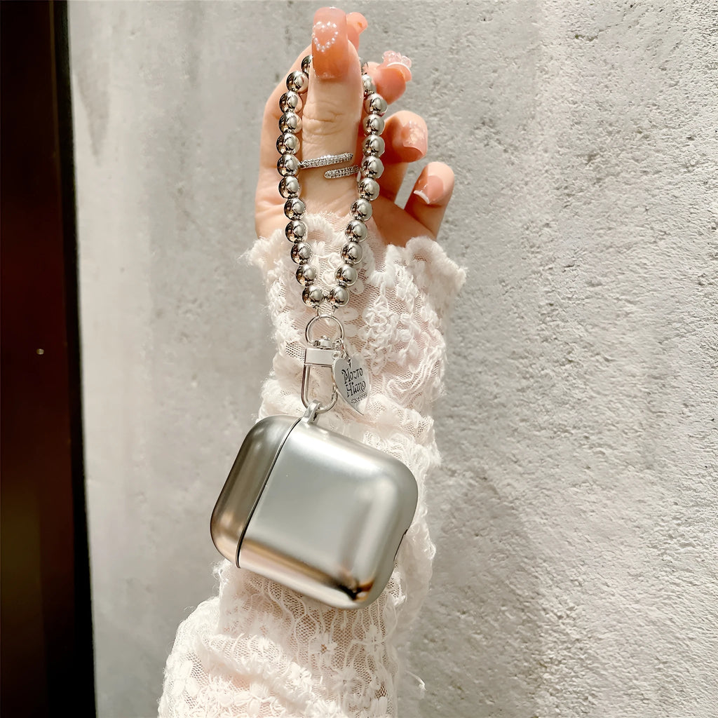 Matte plating protective case for Apple AirPods with an integrated carrying strap.