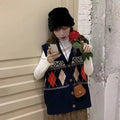 Diamond plaid pattern sleeveless cardigan in loose fit, shown in khaki colour