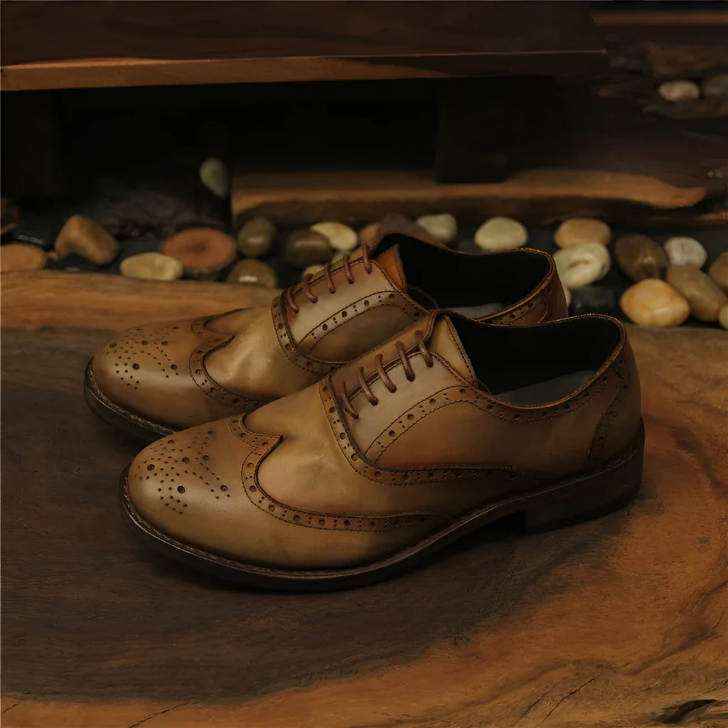 Men's light brown vintage leather shoes with engraved distressing and lace-up closure