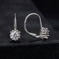 Sterling silver flower bud ear clips with moissanite stone and white gold plating
