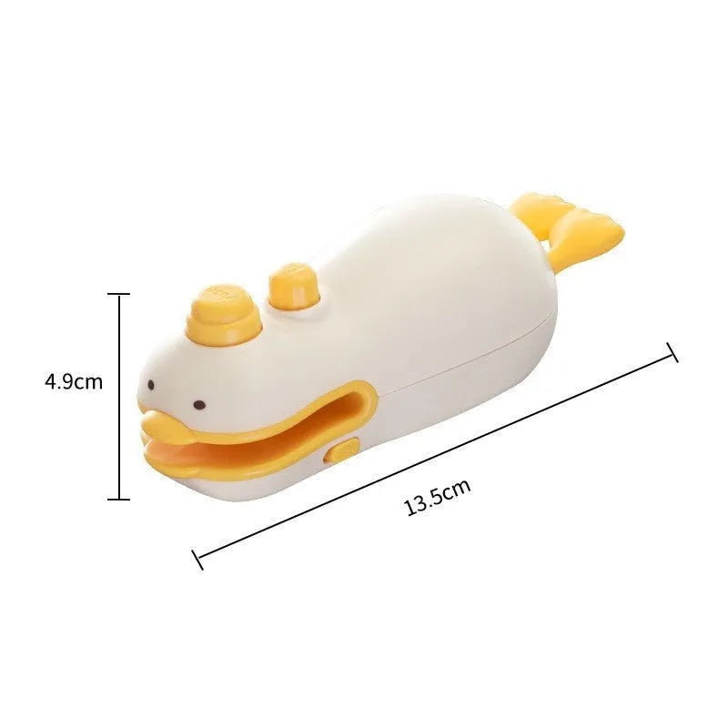 Small yellow duck animal jacquard style rechargeable sealing machine with charging cable.