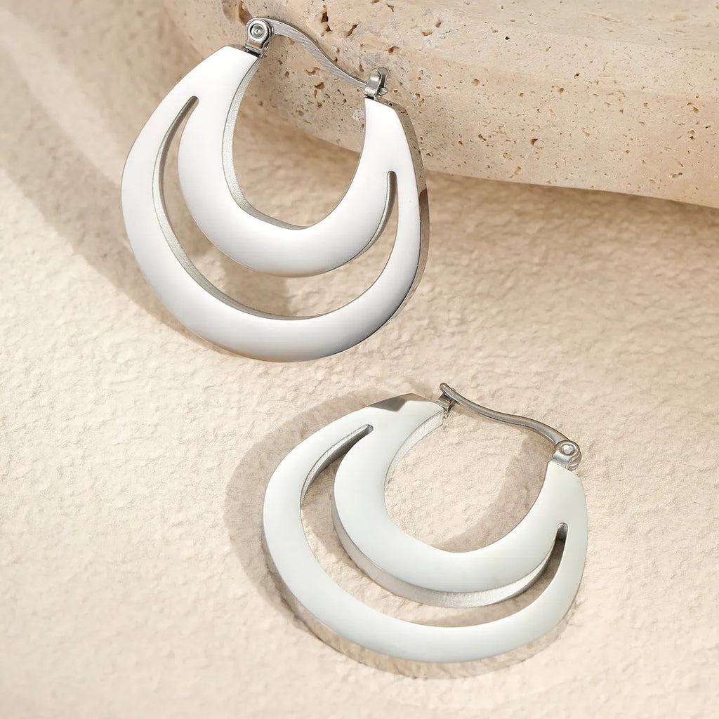 Geometric French earrings with 18K gold plating on stainless steel featuring round ring elements