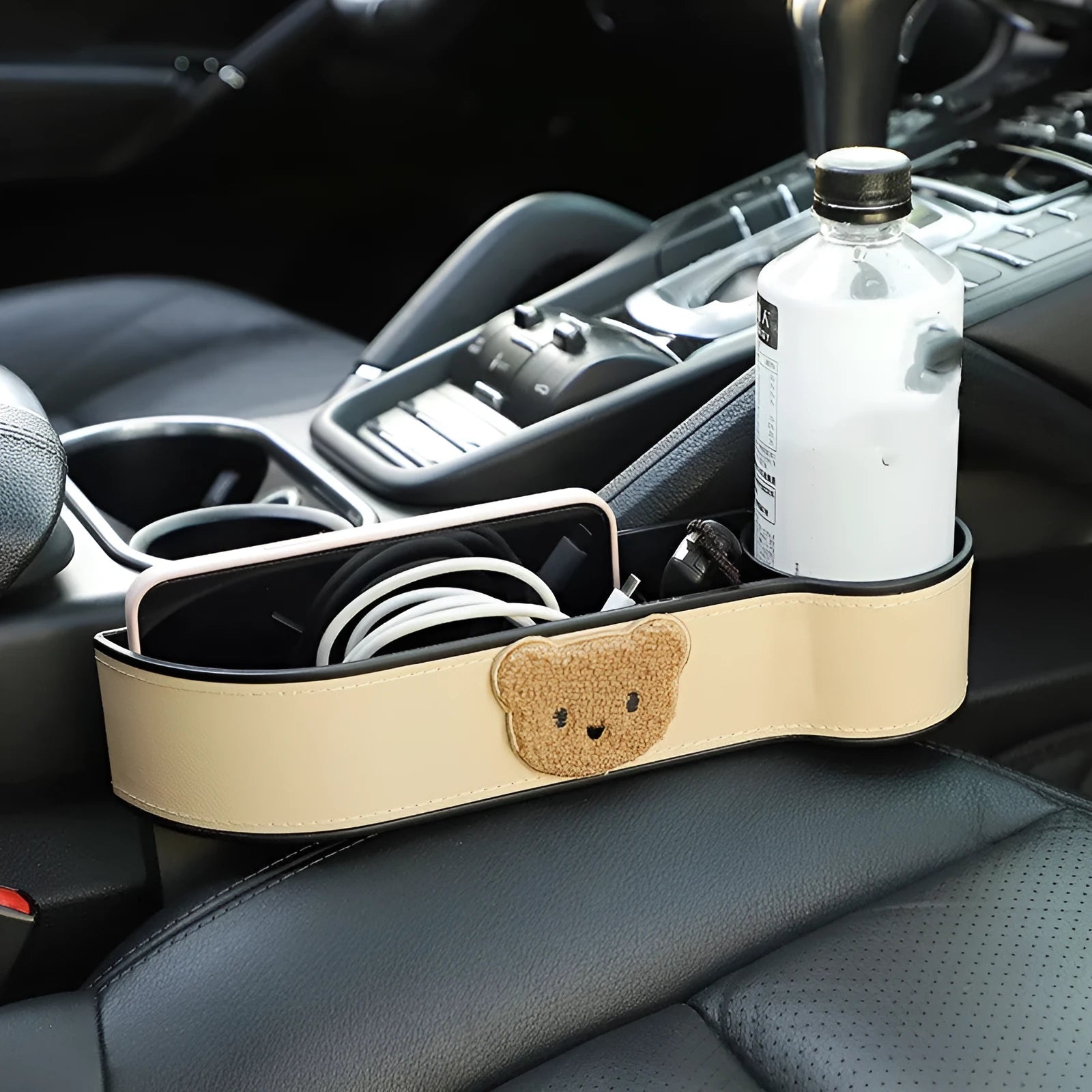 Leather car seat gap storage box with cartoon bear design for centre console organisation.