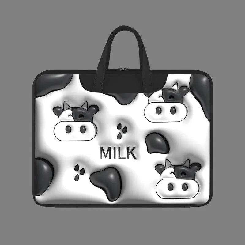 Inflatable PU leather laptop bag in a cartoon panda design with shoulder strap, shown hanging from a suitcase.