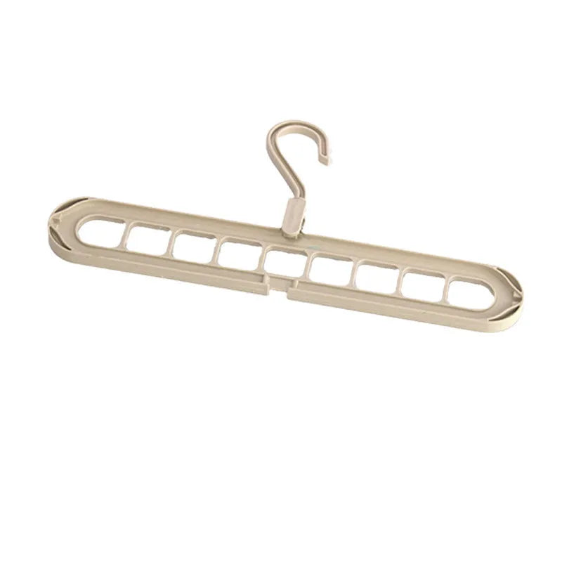 Plastic multifunctional hanger with nine holes for folding trousers, shown in a choice of colours