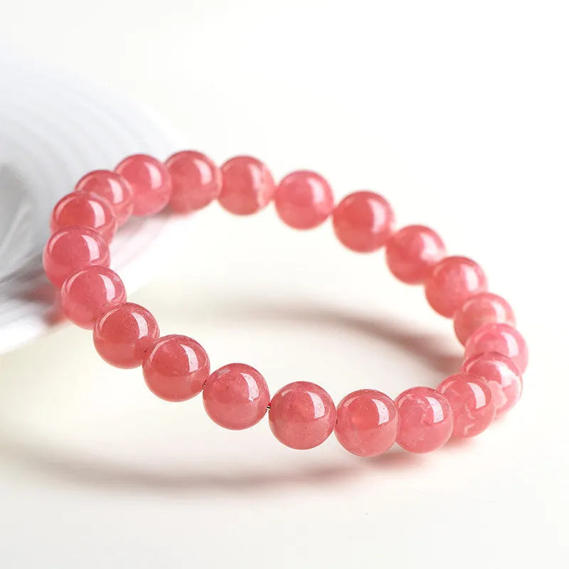 Women's geometric crystal bracelet with longevity lock design in red rhodochrosite stone