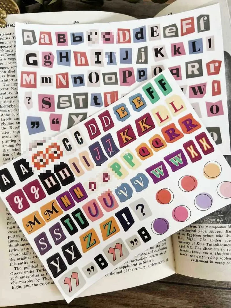 Set of cute style printed stickers showing English letters A, B, C, D, E and weekly words on a sheet.