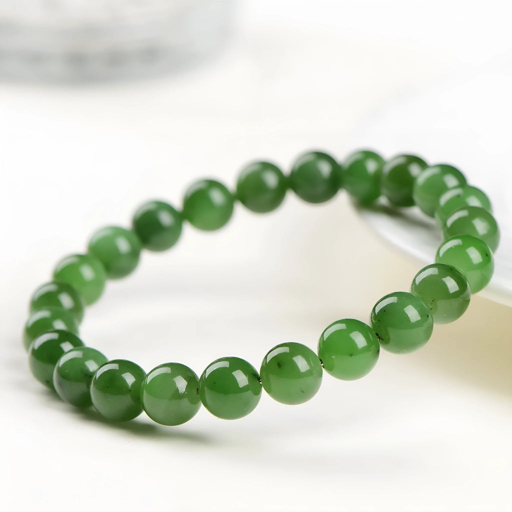Natural Hetian jade jasper bead bracelet with polished finish showing earth-toned beads strung together