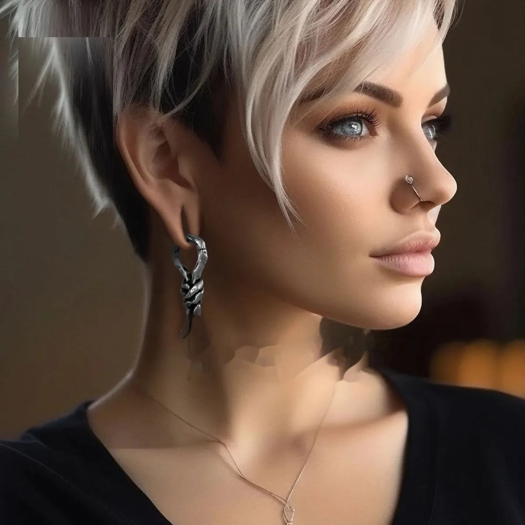 Close-up of 4mm copper bending and connecting earring for auricle piercing.