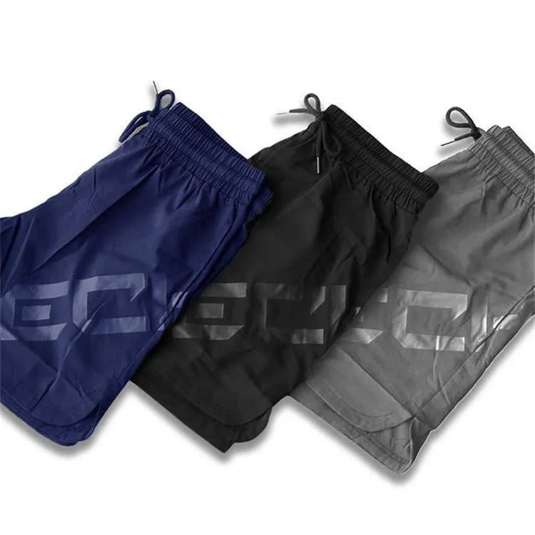 Men's black elastic running shorts with quick-dry fabric and knee-length design for summer training