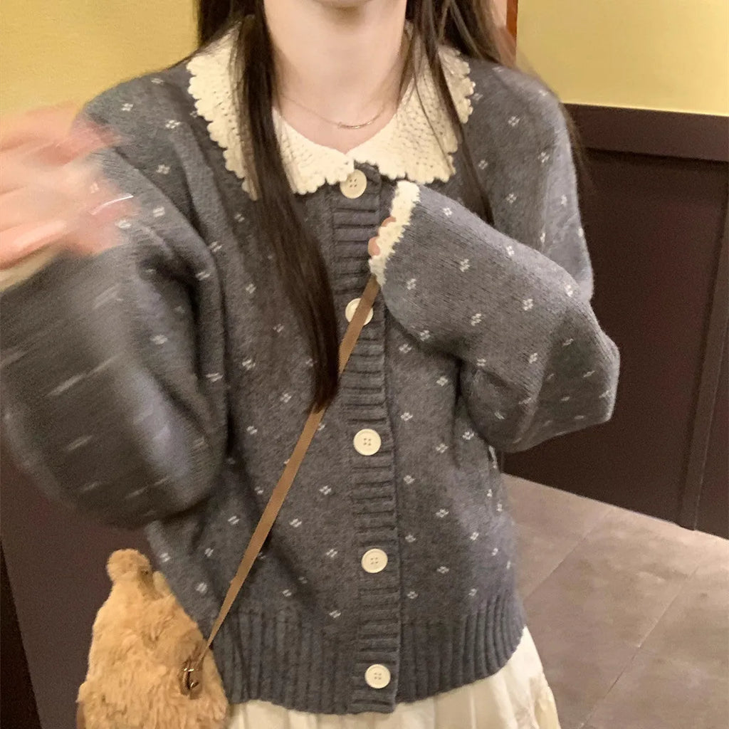 Knitted cardigan coat with Peter Pan collar in navy blue with floral pattern