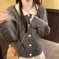 Knitted cardigan coat with Peter Pan collar in navy blue with floral pattern