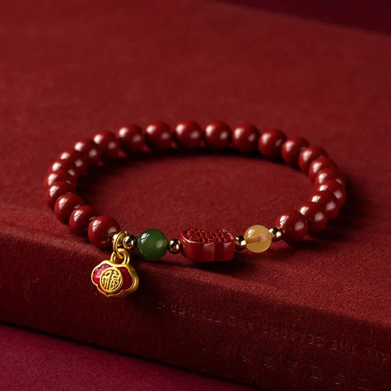 Emperor Sandstone colour cinnabar bracelet with Fu character, showing 6mm and 8mm bead size options.