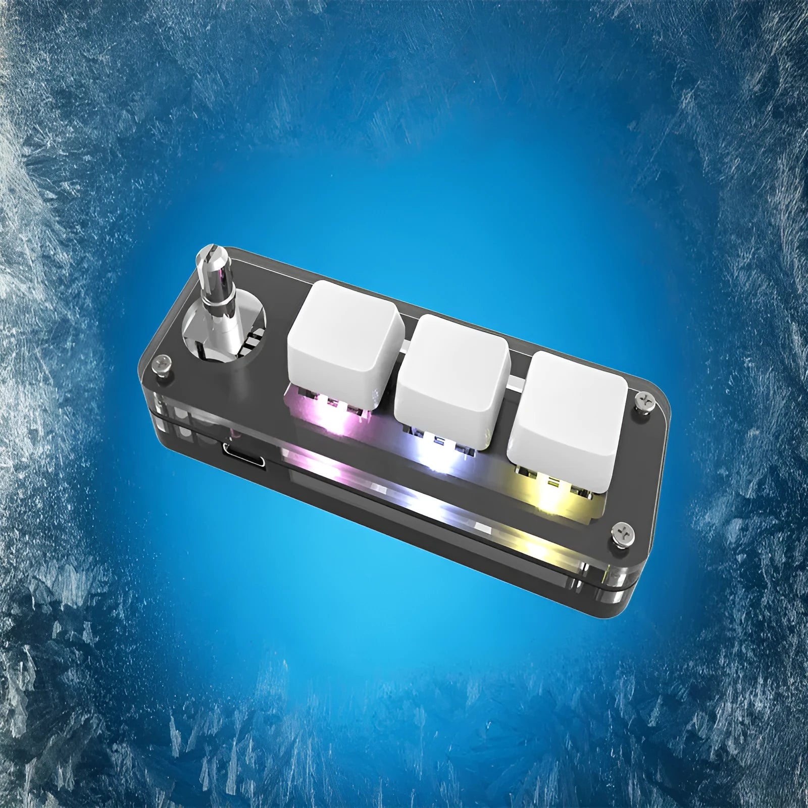 Compact black USB keypad with RGB colourful backlighting on a desk.