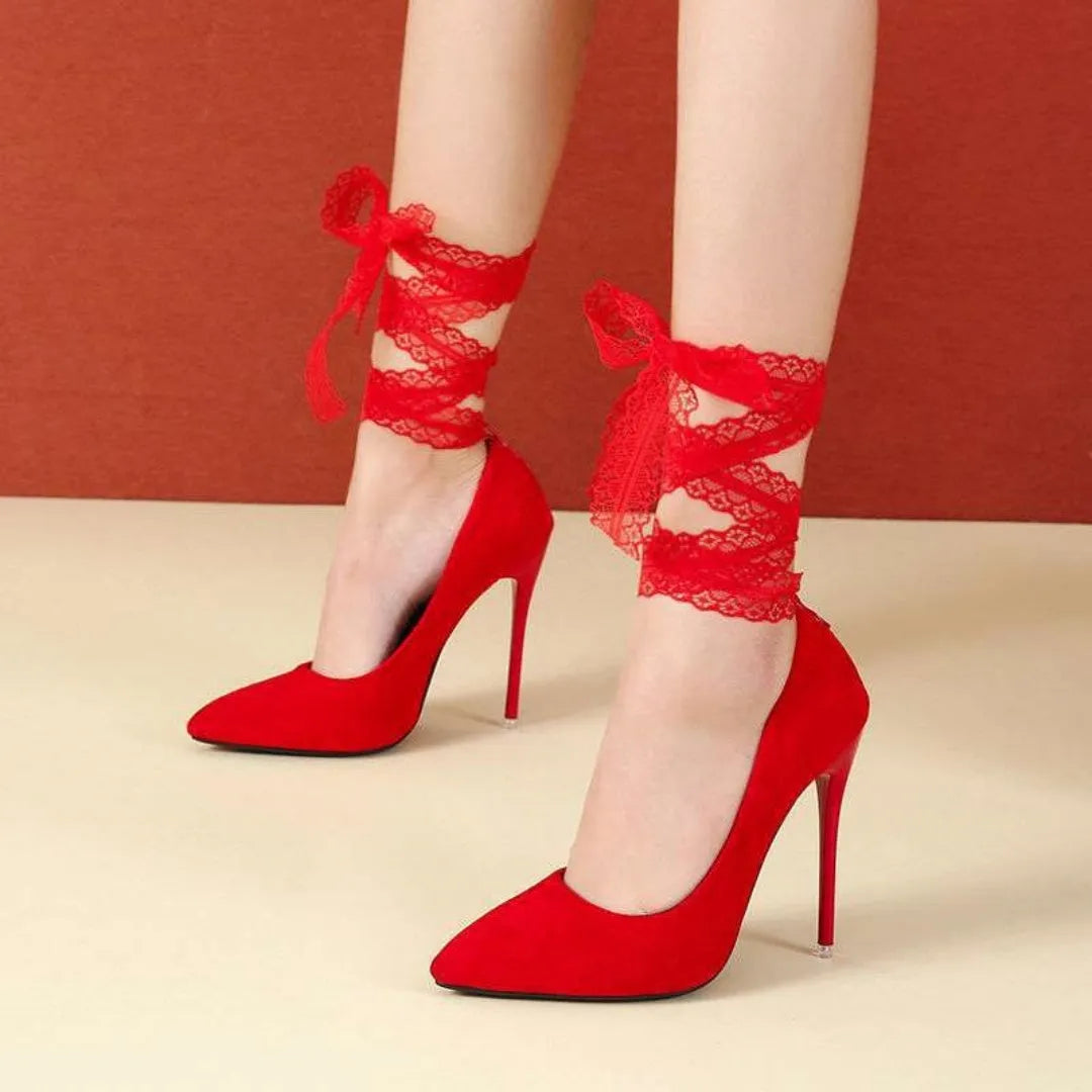 Women's black pointed-toe high-heel shoes with thin strap and flat buckle closure
