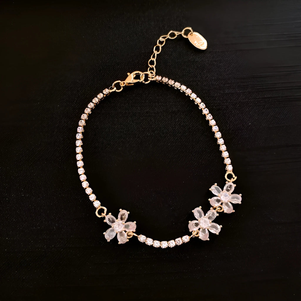 Gold tone quadrilateral geometry women's bracelet with inlaid zircon elements on copper