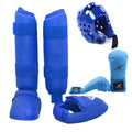 Karate protective gear set showing red helmet, boxing gloves and leg guard for martial arts training