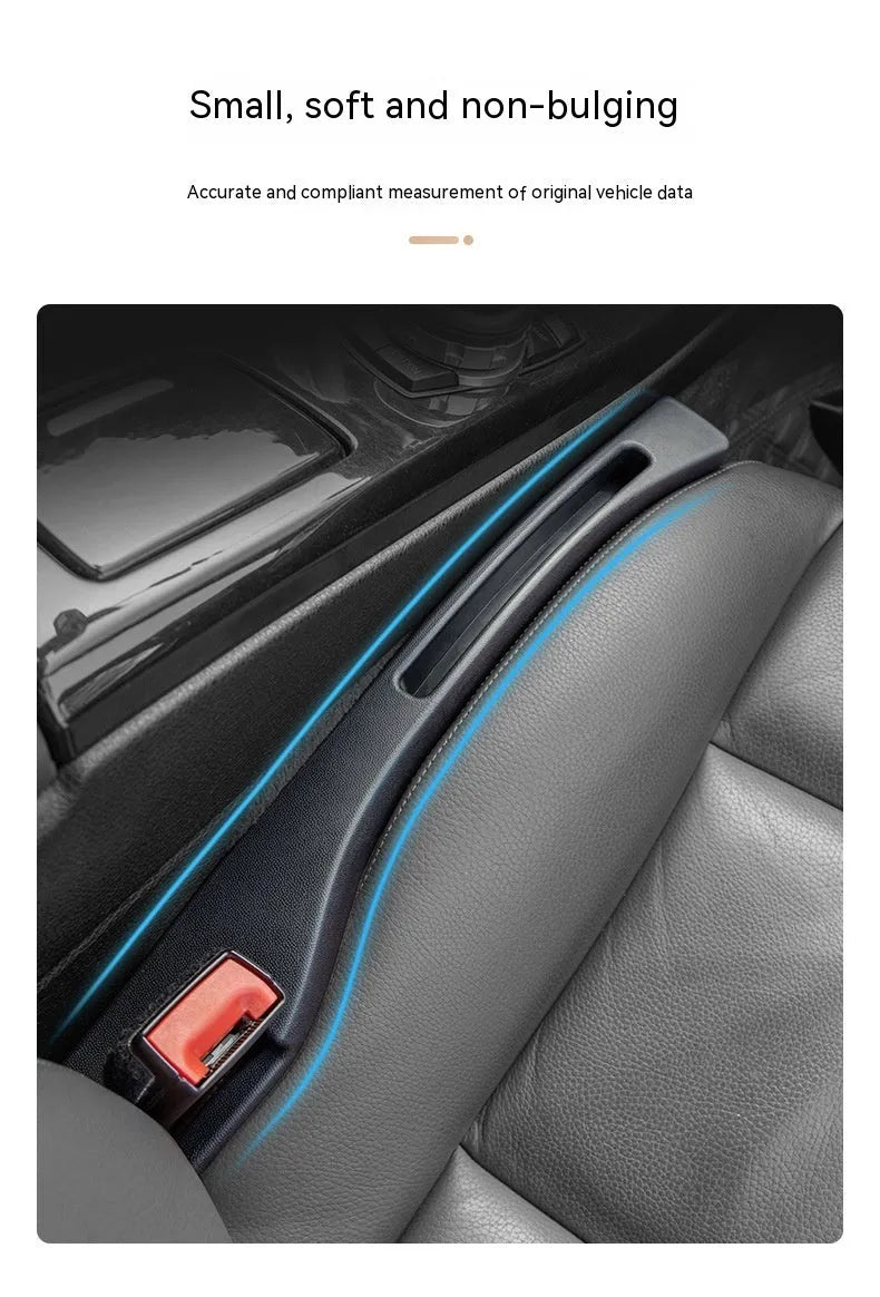 Black plastic car seat gap storage organiser box with a handle.