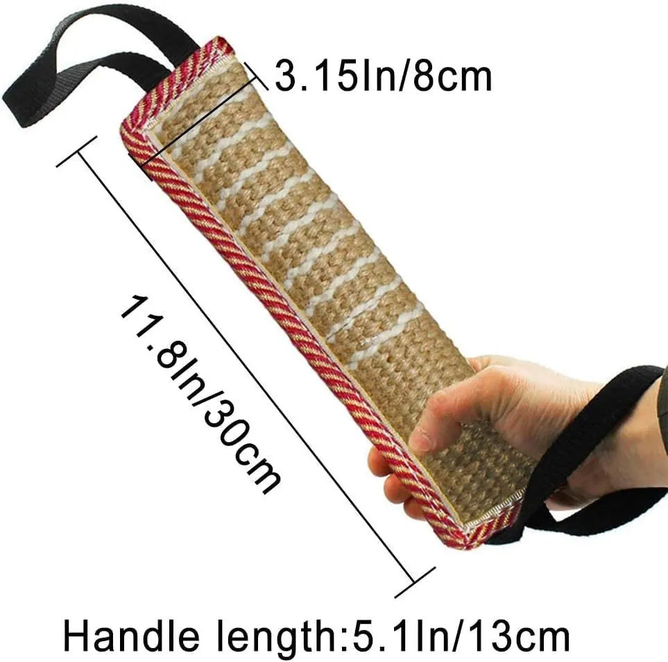 Beige jute dog tug toy with two fabric handles on a wooden floor